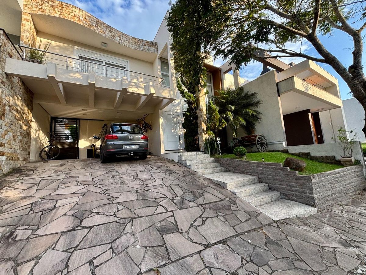 Casa com 3 dormitórios à venda, 200 m² - Dom Feliciano - Gravataí/RS