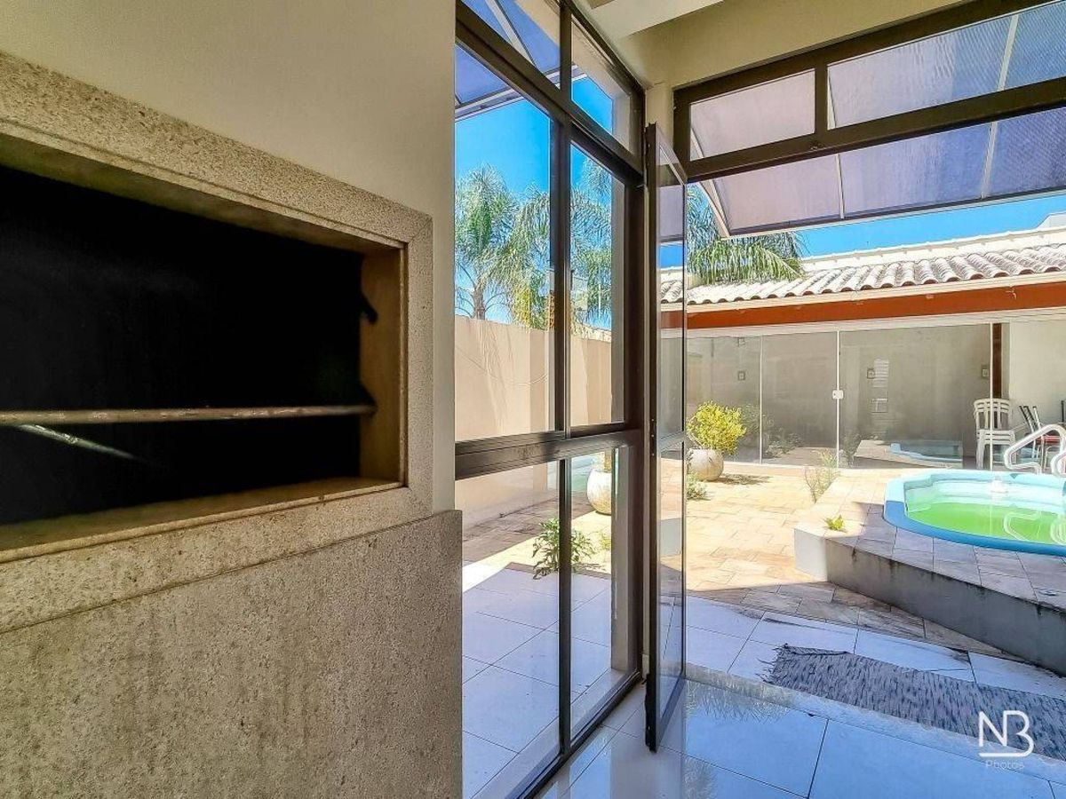 Casa com 3 dormitórios, 335 m² — foto 3
