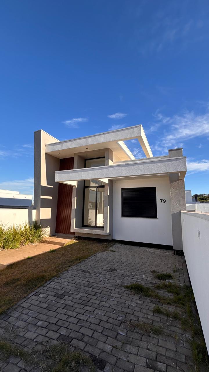 Casa 3 dormitórios · 90 m² — foto 2