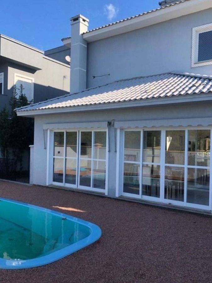 Casa com piscina · 4 dormitórios · 240 m² — foto 24